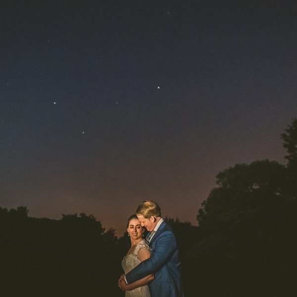 dramatic nighttime wedding portrait