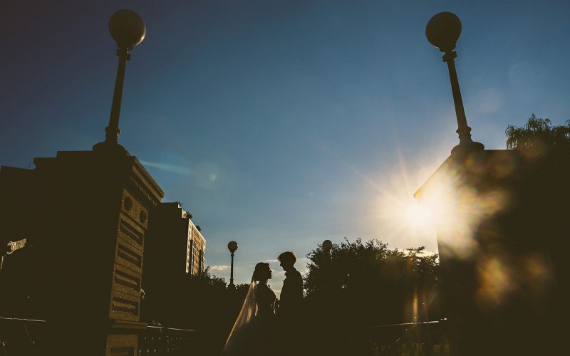Boston Public Garden wedding silhouette with sun flare