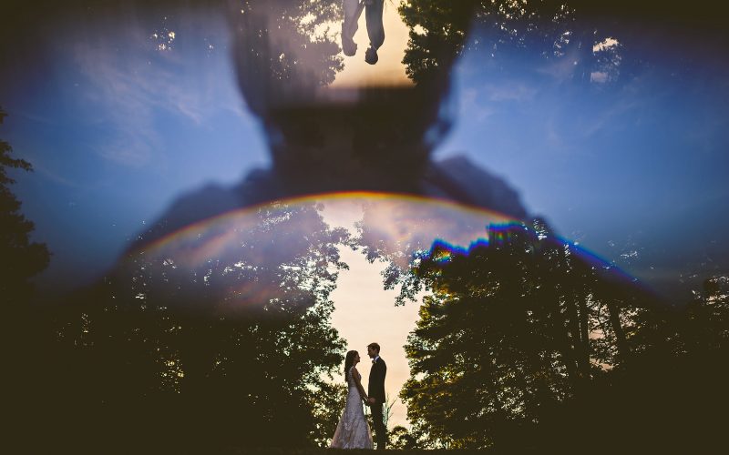 creative reflected wedding portrait in prism