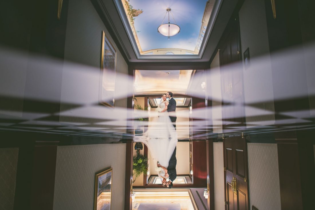 Reflection portrait at Colonnade Hotel wedding