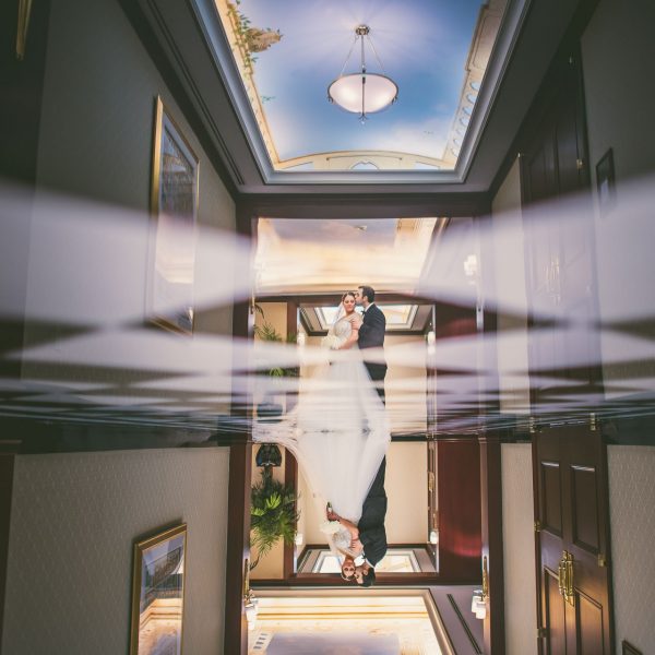 Reflection portrait at Colonnade Hotel wedding