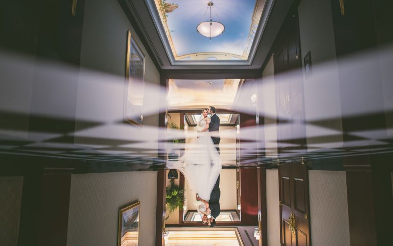 Reflection portrait at Colonnade Hotel wedding